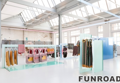 Women's dress display stand and hanging rack design for clothing pop up store design