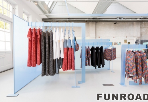 Women's dress display stand and hanging rack design for clothing pop up store design