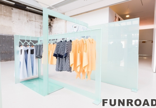 Women's dress display stand and hanging rack design for clothing pop up store design