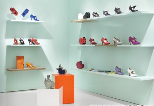 Mint Green Wall-mounted Shoes Display Rack for Brand Store Interior Design